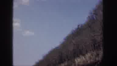 Hawaii USA (1959): Vintage Clip Of A Panning View Of A Cliff Side Down To A Road