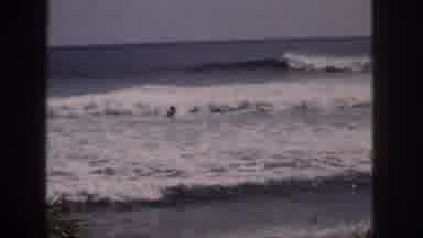 Hawaii USA (1959): Man Surfing In The Sea Lying Down