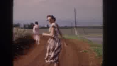 Hawaii USA (1959): Inspecting Crops On A Dirt Road
