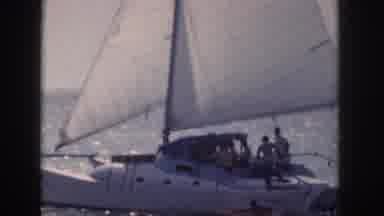 HAWAII USA-1959: Sailing Catamaran On Calm Ocean Waters