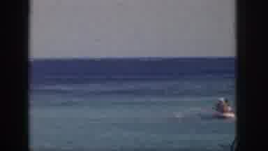 Hawaii USA (1959): People Kayaking On A Lake Or Ocean