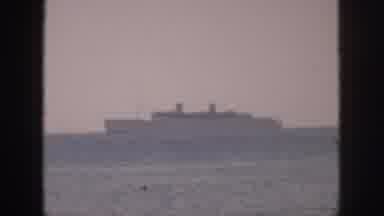 Hawaii USA (1959): Cruise Ship Sailing Fast On A Smooth Ocean During A Cloudy Day