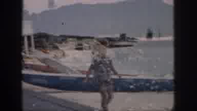 Hawaii USA (1959): Young Girl Walking On Beach With Overlaid Footage Of Hills Seen