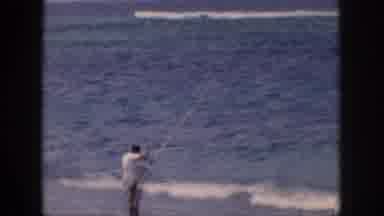 Hawaii USA (1959): Man Fishing In The Ocean On The Beach