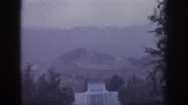 Hawaii USA (1959): Impressive White Building With Hills And Mountains Behind It