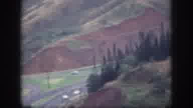 Oahu Hawaii USA (1959): Winding Road Through Rolling Hills Of Trees With Cars