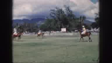 Oahu Hawaii USA (1959): Horses Racing Along Track While Playing Polo With Sticks