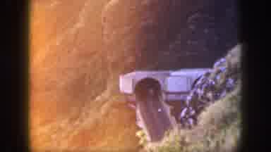 Oahu Hawaii USA (1959): Cars Traveling Through Mountain Tunnel In The Hilly Green