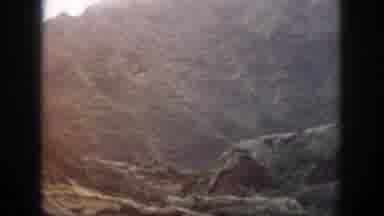 Oahu Hawaii USA (1959): Steep And Rugged Mountains With Little Vegetation Above A