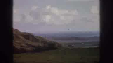 Oahu Hawaii USA (1959): A Green Valley Filled With Grass And Trees Is Surrounded