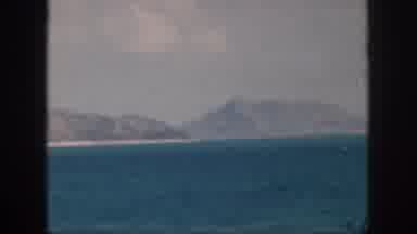 Oahu Hawaii USA (1959): Person Recording Hills From Water