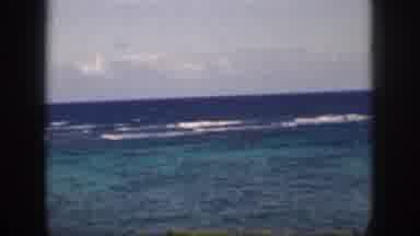 Oahu Hawaii USA (1959): Waves Coming Into Shore On A Tropical Island With Clouds