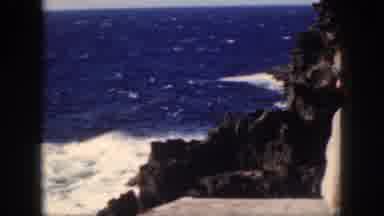 Oahu Hawaii USA (1959): A Woman Sits On On The Edge Of Cliff Overlooking The Ocean