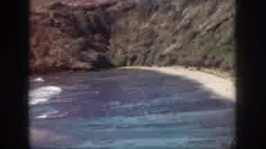 Oahu Hawaii USA (1959): Waves Continuously Breaking Onto Shore Of Beach On Clear