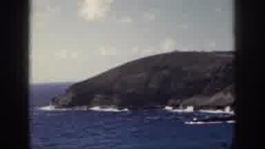 Oahu Hawaii USA (1959): Deep Blue Ocean Crashing Waves Against The Rocky Shore