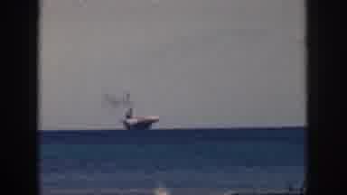 Oahu Hawaii USA (1959): One Large Boat Out On An Open Ocean And Waves Crashing On