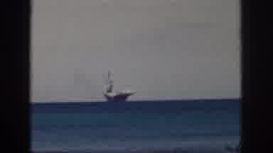 Oahu Hawaii USA (1959): Time Lapse Of Boat Capsizing In Distance From A Tree Side