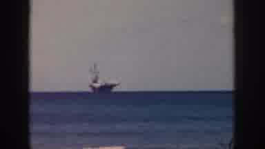 Oahu Hawaii USA (1959): Aircraft Carrier Close From A Beach During A Calm Sea