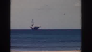 Oahu Hawaii USA (1959): A Huge Sailing Ship Sailing Through A Deep Blue Sea