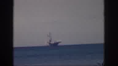 Oahu Hawaii USA (1959): Ship Possibly An Aircraft Carrier Or Freighter Moving On
