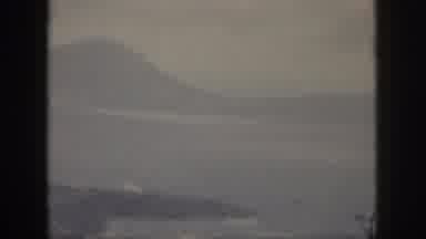 Oahu Hawaii USA (1959): Seashore With Land And Green Mountains Along With Small