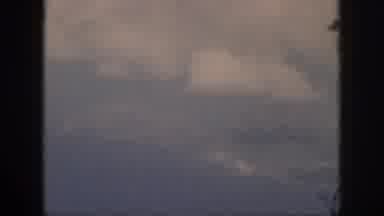 Oahu Hawaii USA (1959): A Scenic Aerial View Of The Coast Thru The Clouds From An