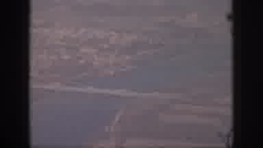 Oahu Hawaii USA (1959): High Aerial View From A Plane Of A Bridge Across A River