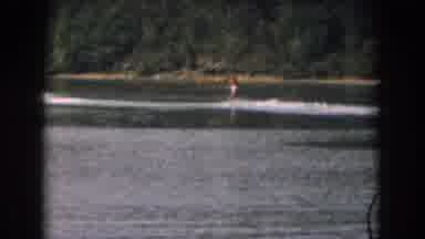 Grand Rapids Michigan USA (1961): A Person Skiing Behind A Moving Boat On A Calm