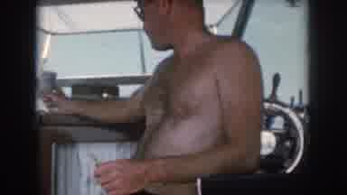 Grand Rapids Michigan USA (1961): A Man In A Bathing Suit With Glasses In A Boat