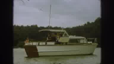 Michigan USA (1961): View Of A Motorboat On The Water Slowly Moving Away From The