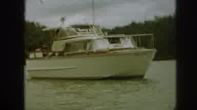 Michigan USA (1961): People Sailing In A Large Expensive White Yacht