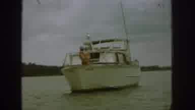 Michigan USA (1961): Man And His Son Sailing On A Beautiful Day