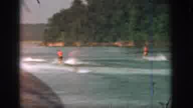 Michigan USA (1961): Film Of Life Vest Clad People Water Skiing On Lake With A