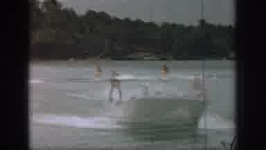 Michigan USA (1961): Two Water Skiers Are Pulled Behind A Boat