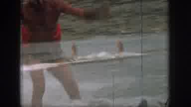 Michigan USA (1961): People Water Skiing On A Body Of Water