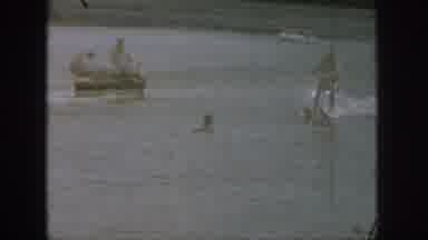 Michigan USA (1961): A Man Water Skiing Behind A Boat Combined With Him Falling