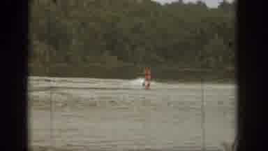 Michigan USA (1961): Two People Out On The Lake With A Boat And Ski Jet
