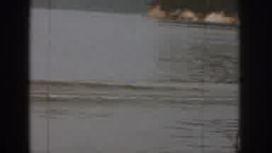 Michigan USA (1961): Man Falls Off Of Water-Skis And Swims Back Over To Boat