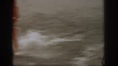 Michigan USA (1961): Two People Water Skiing Side By Side Using Separate Ropes