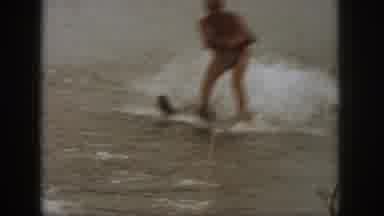 Michigan USA (1961): People Are Boating And Water Skiing On A Lake