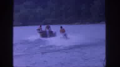 Michigan USA (1961): Young Boys Learning To Surf In A Lake In The Afternoon
