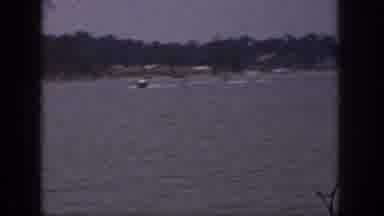 Michigan USA (1961): Two People Water Skiing Behind A Speedboat On A Lovely Summer