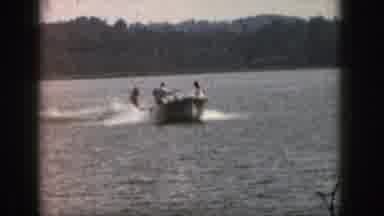 Michigan USA (1961): Water Skier Comes Up To Boat To Get Back In And Talk To