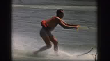 Michigan USA (1961): Man Water Skiing On Lake Behind Boat