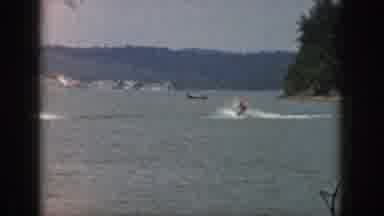 Michigan USA (1961): Two Videos Sequences Water-Skiing Man Pulled By A Boat In A