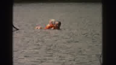 Michigan USA (1961): A Couple Wiped Out After Jet Skiing In The Lake And Are