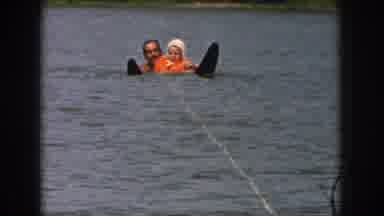 Michigan USA (1961): Father Playing With His Daughter In Water