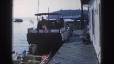 Michigan USA (1961): Man Getting Off A Boat