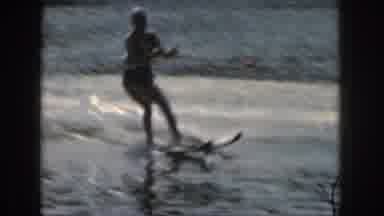 Michigan USA (1961): Female Water Border Trips And Falls Forward Into The Water