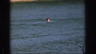 Michigan USA (1961): A Girl Is Enjoying To Swim In The Ocean